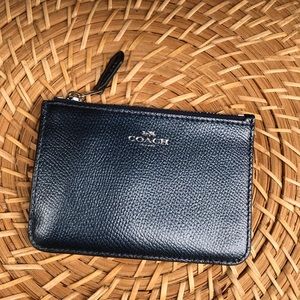 Blue metallic Coach wristlet